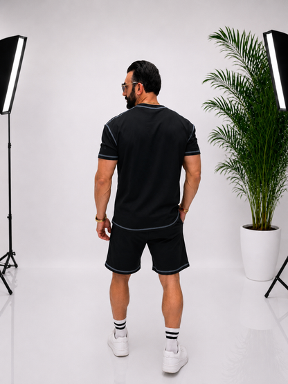 Set bărbătesc negru – eleganță modernă, flexibilitate și design care evidențiază silueta